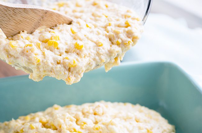 pouring corn mixture to a casserole dish