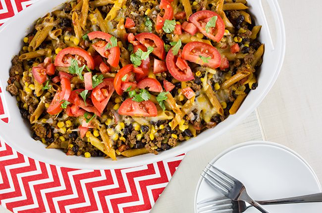Overhead picture of large white baking dish filled with mexican casserole