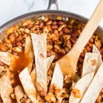 Easy Cheesy Mexican Dinner Burrito Skillet in a pan