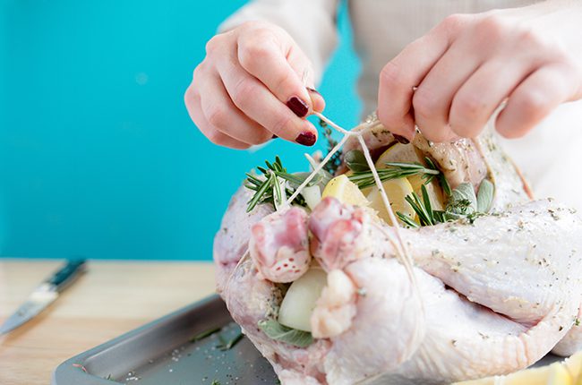 tying the legs of a turkey