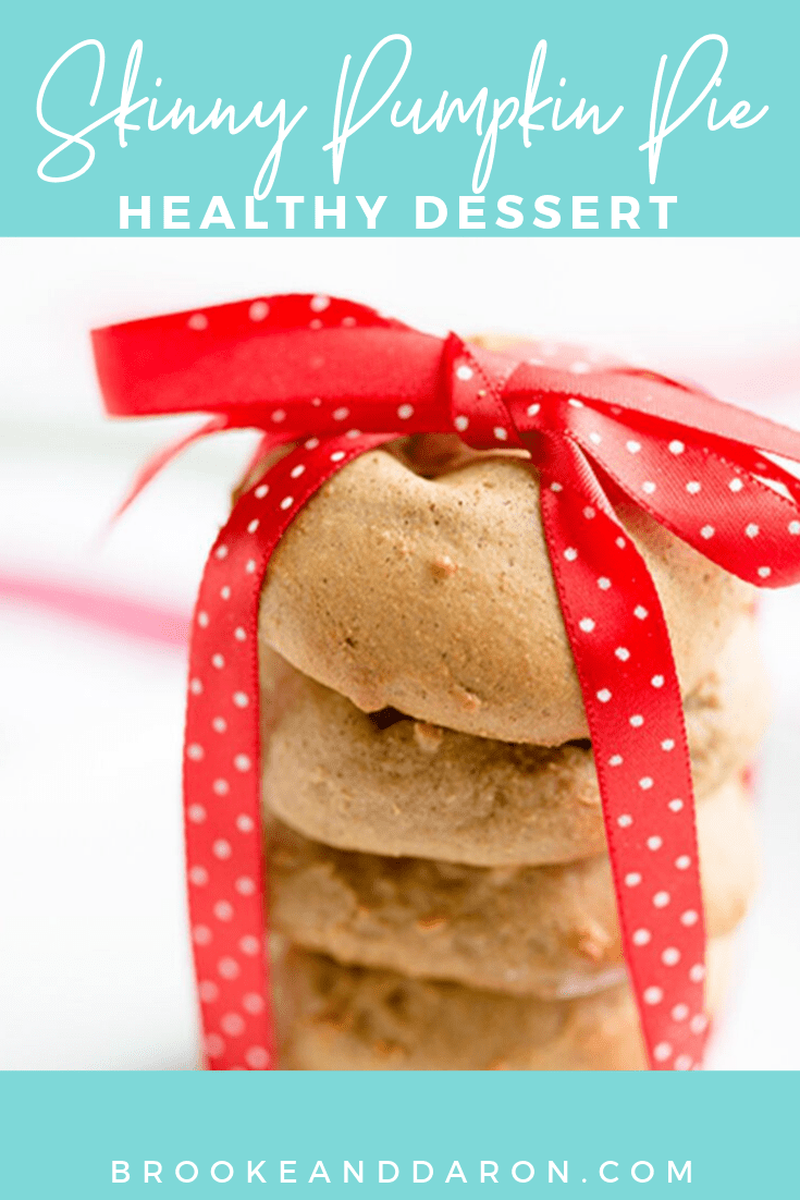Soft Gingerbread Cookie recipe stacked and tied together with a red ribbon