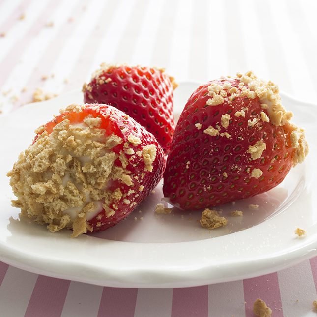 upclose picture of cheesecake stuffed strawberries