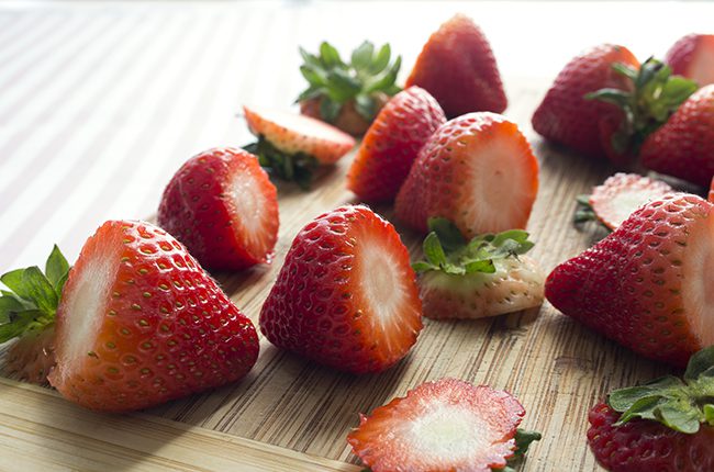 cut the stems off the strawberries