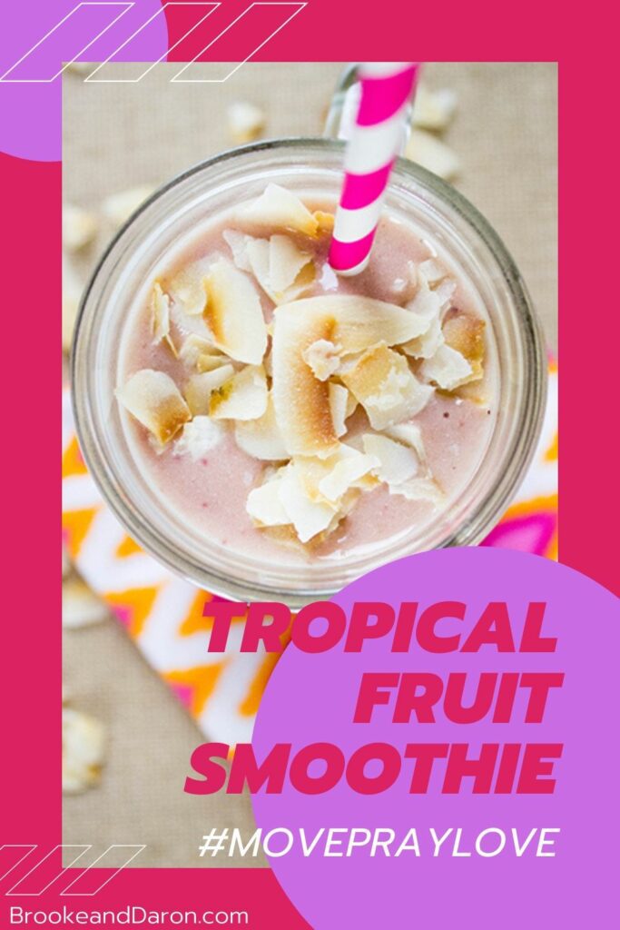 Glass jar of smoothie on pink and orange napkin