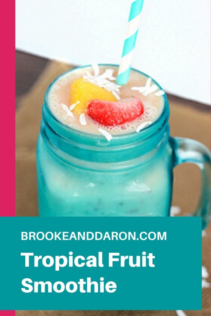 Blue mason jar glass filled with smoothie