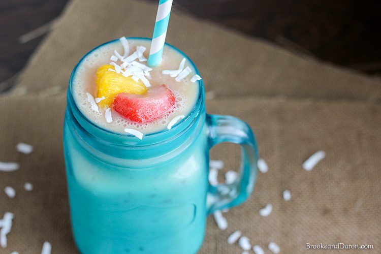 Blue mason jar with striped straw