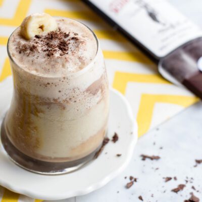 A glass of chocolate and banana protein smoothie
