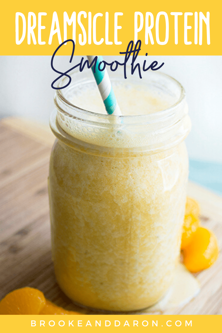 Dreamsicle orange banana smoothie in mason jar with straw