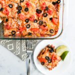 Overhead picture of mexican lasagna on a plate and in baking dish