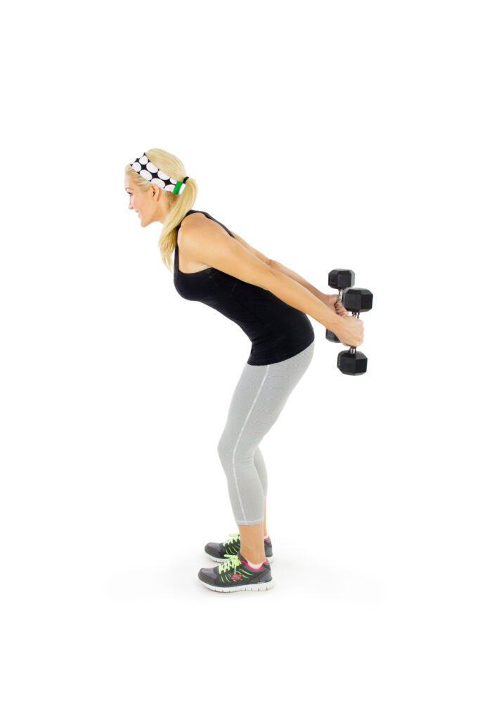 image of Brooke doing a tricep kickback exercise for dumbbell arm workout routine